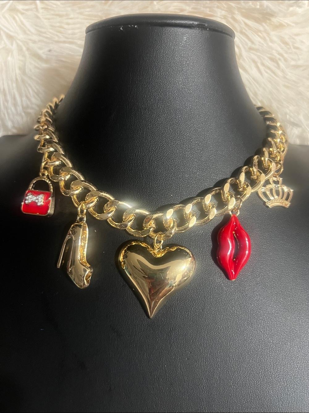 Gold Charm Statement Necklace with Red Accents